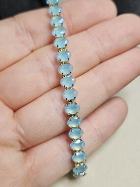 Stainless Steel Gold Over Bracelet with Aqua Blue Cabochon Stones